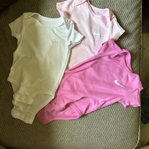 Nike Pink Baby Bodysuit